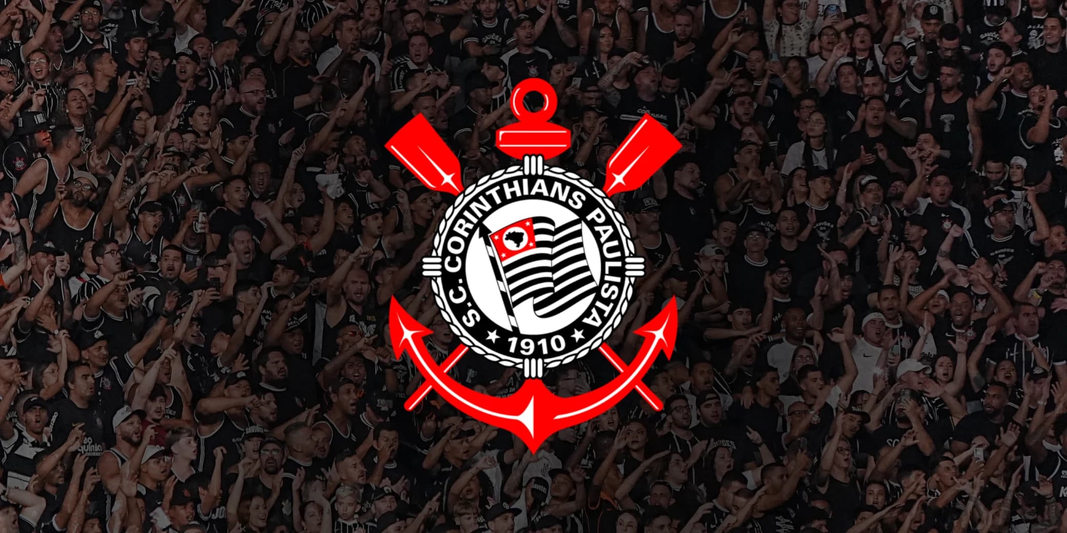 Torcida do Timão reunida em estádio lotado ao fundo com o escudo oficial em destaque em primeiro plano, ilustrando curiosidades do Corinthians.